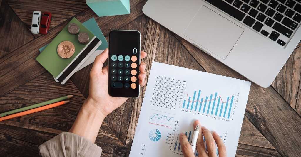 person holding calculator