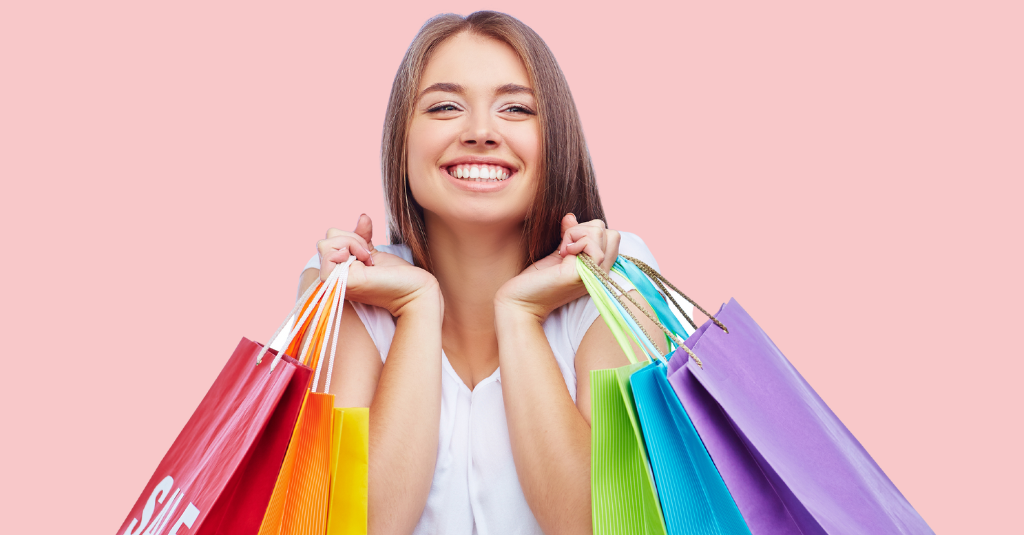 lady smiling with shopping bags
