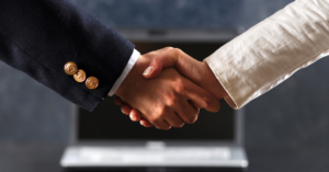 two men shaking hands