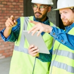 Construction engineers talking