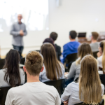 students listening on a professor.