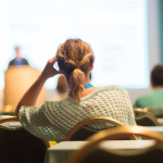 a person in a class thinking about Higher Education Lead Generation