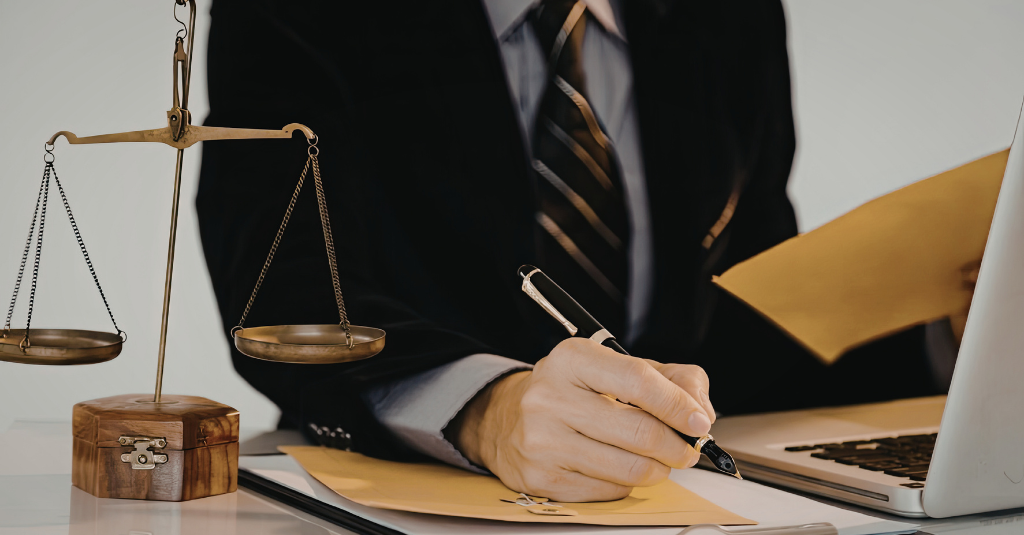 A lawyer in a lawfirm checking on Hubspot for lawfirms
