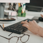A person doing a HubSpot comparison between other crms