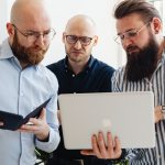 a team looking at a HubSpot Smart CRM