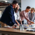 A marketing team discussing about 5 Reasons Teams Underuse Marketing Automation Consulting