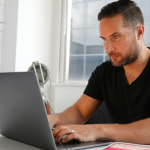 A person setting up in Hubspot using a Hubspot guide